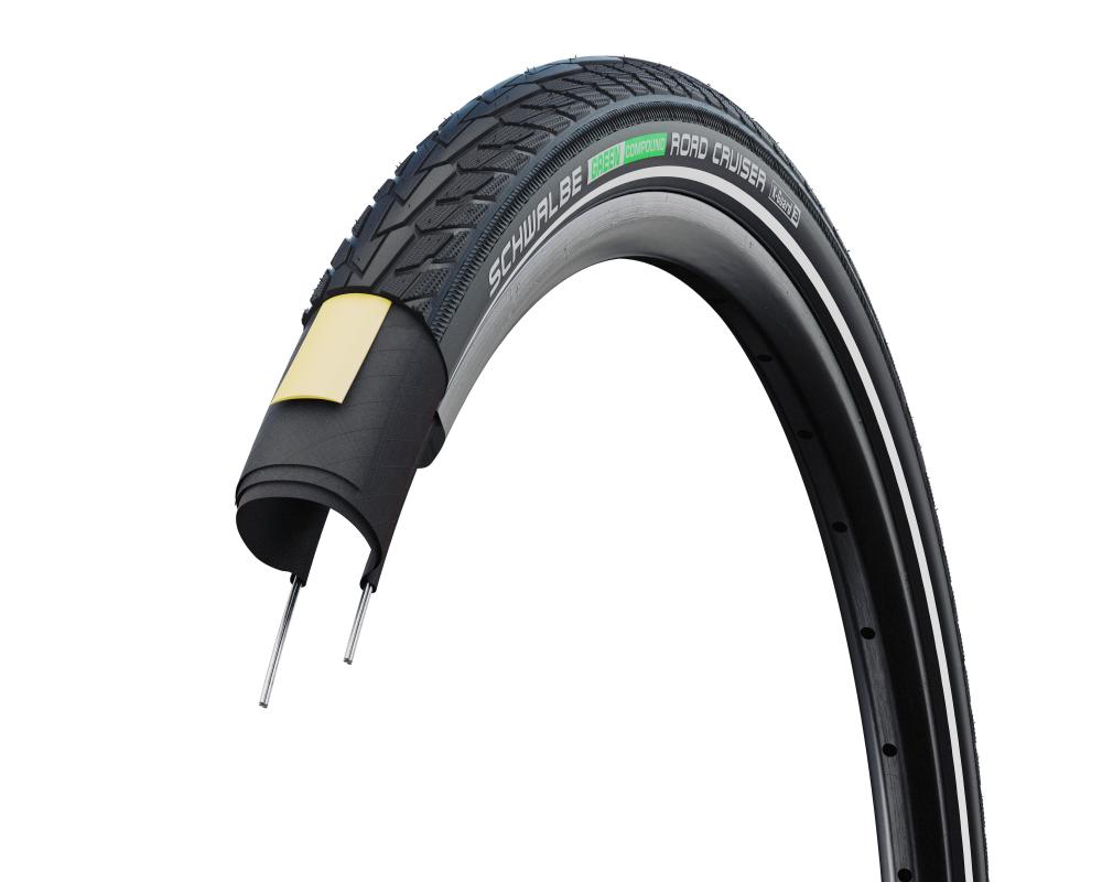 Schwalbe ROAD CRUISER Fahrradreifen 26x1.75 mit K-Guard Pannenschutz und GREEN Compound, aufgeschnitten.