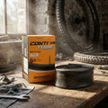 Continental Conti MTB 26 Light Fahrradschlauch 26x1.75/2.40" SV 42mm in Werkstatt, Box und Schlauch.