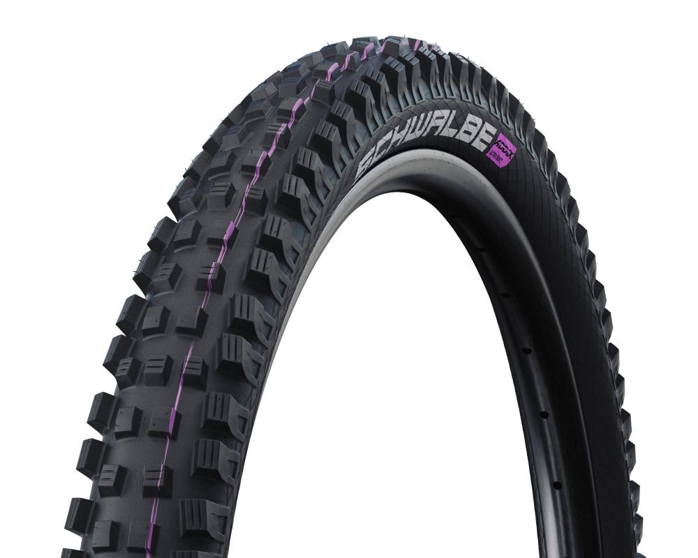 Schwalbe Magic Mary Faltreifen 27.5x2.60 schwarz, robustes MTB Profil mit lila Streifen.