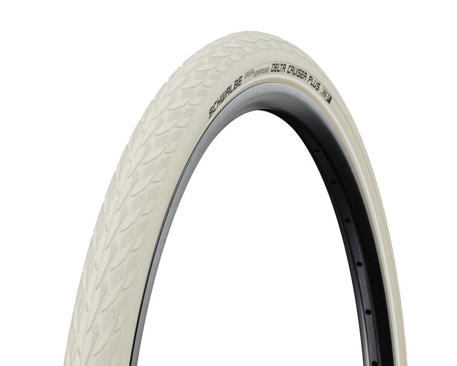 Schwalbe Delta Cruiser Plus 28x1.40 Fahrradreifen in Creme mit Reflexstreifen und klassischem Profil.