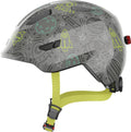 Abus Kinderhelm Smiley 3.0 LED grey space mit Raketen und Sternen, Größe S 45-50cm, gelbe Riemen, Seitenansicht.