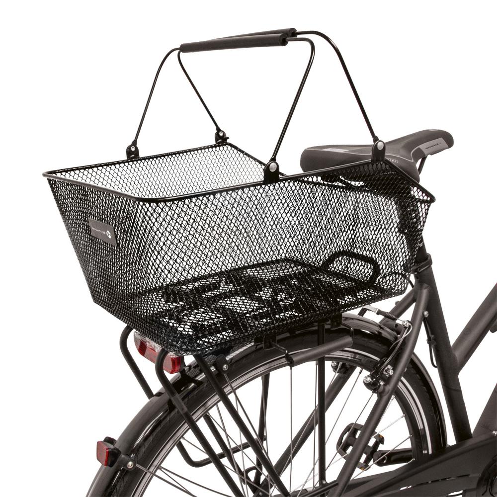 M-WAVE BA-RM Clamp L Gepäckträgerkorb schwarz aus Stahl mit Klemmbefestigung und PU-Griffen am Fahrrad montiert.