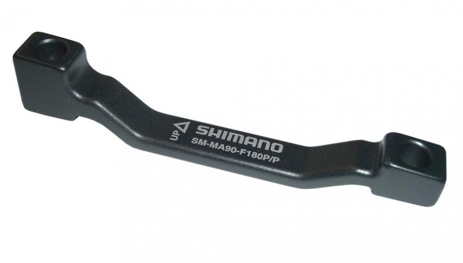 Schwarzer SHIMANO Fahrrad Scheibenbremsadapter PM PM 180mm für 180mm Rotor mit Schriftzug.