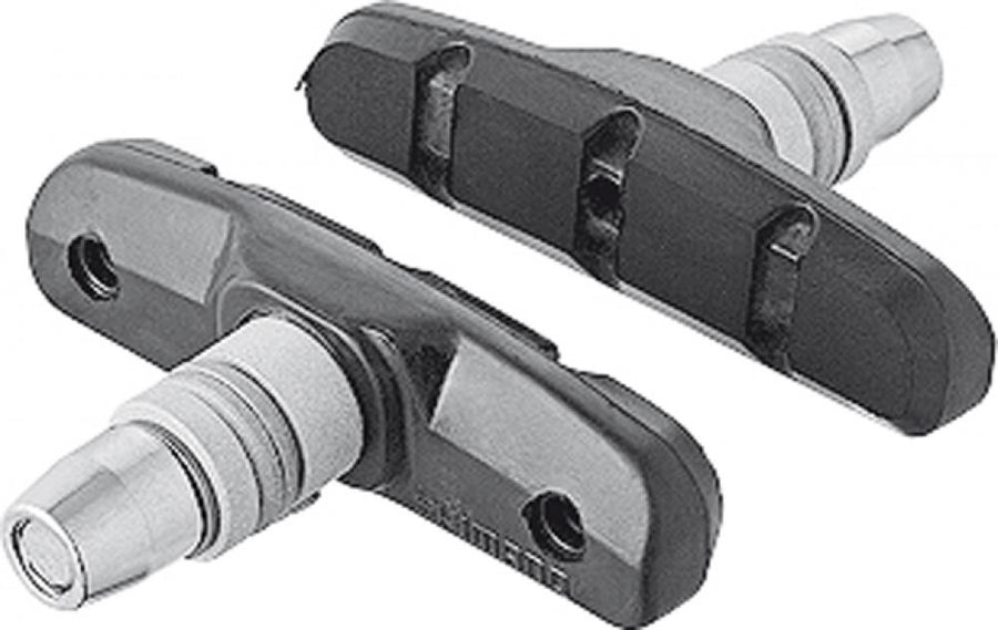Zwei schwarze Shimano V-Brake-Bremsschuhe S65T mit Befestigungsschrauben für zuverlässige Bremsleistung.