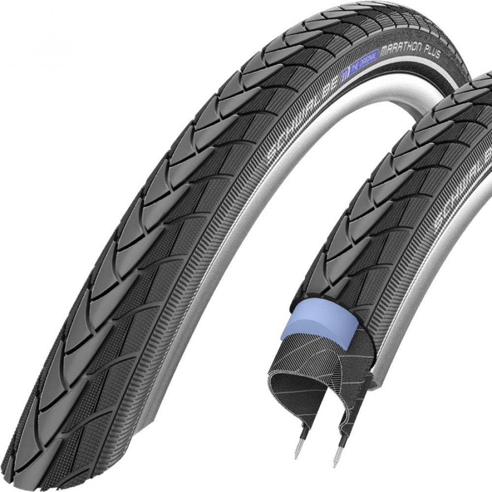 Schwalbe Marathon Plus Fahrradreifen, pannensicher mit Reflexstreifen, Querschnitt zeigt Schutzschicht.