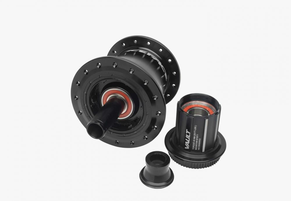 Race Face Vault Hinterradnabe HR 32L 148x12mm Shimano HG schwarz, zerlegt mit Freilauf und Endkappe.
